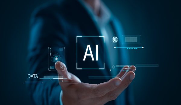 Businessman using artificial intelligence (AI) technology in future business, using artificial intelligence to make business more efficient, IoT, innovation and the future.