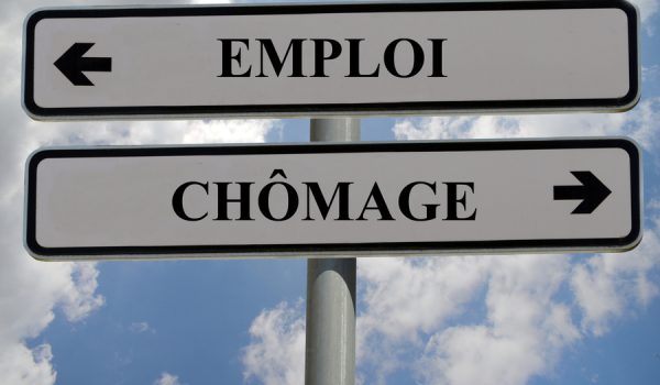 Signs indicating employment and unemployment