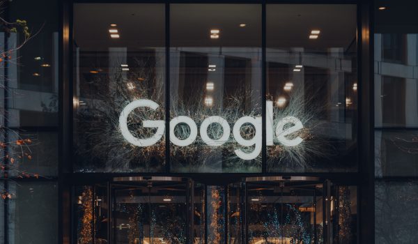 London, UK - January 01, 2022: Name sign above the entrance of Google offices in London. First Google office in the UK in opened in 2003 and has since grown to accommodate thousands of employees.