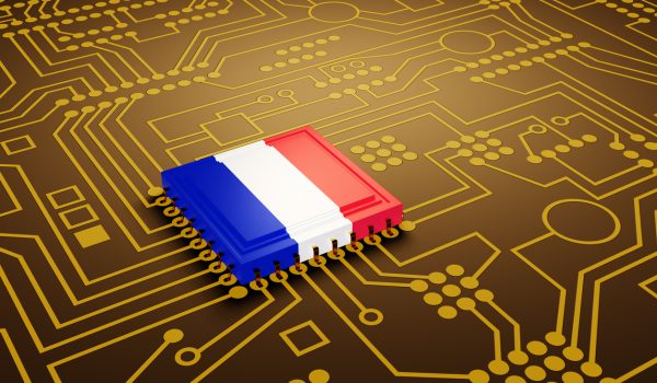 An advanced CPU printed with a national flag of France on a neon glowing electronic circuit board. Illustration of the concept of French made high-end micro chips.