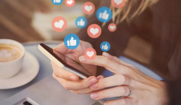 likes on social media on smartphone, online communication